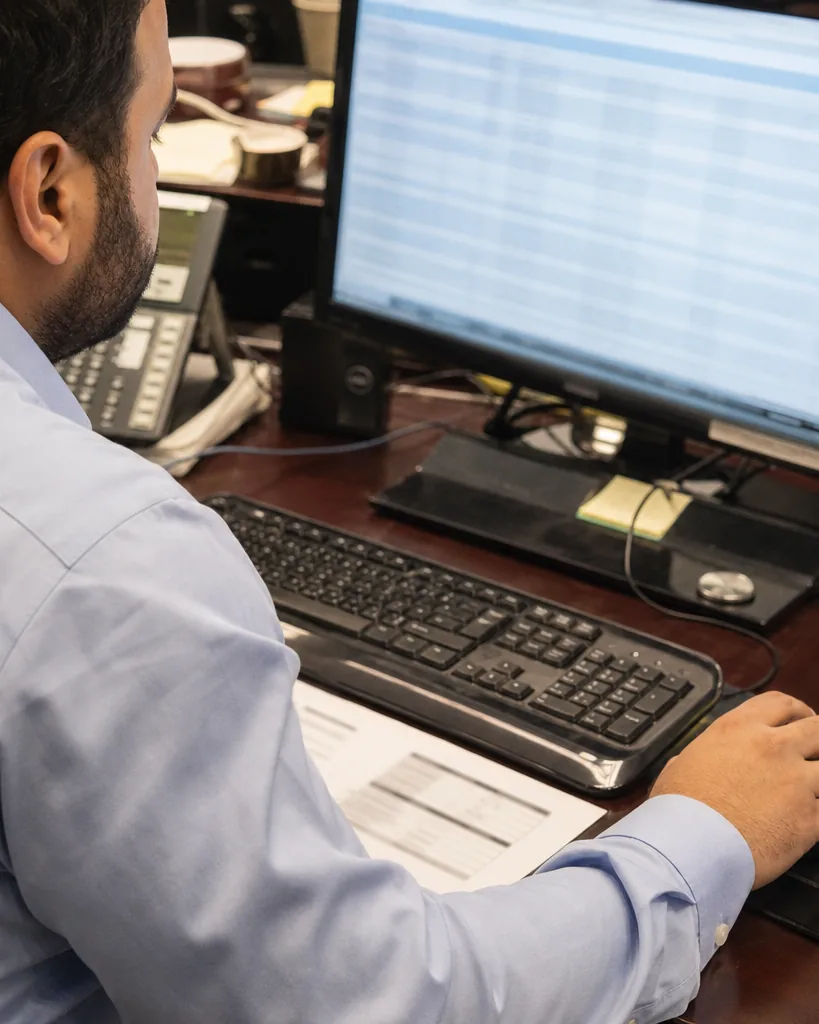 Treasury operator reviewing a queue of outgoing wire transfers